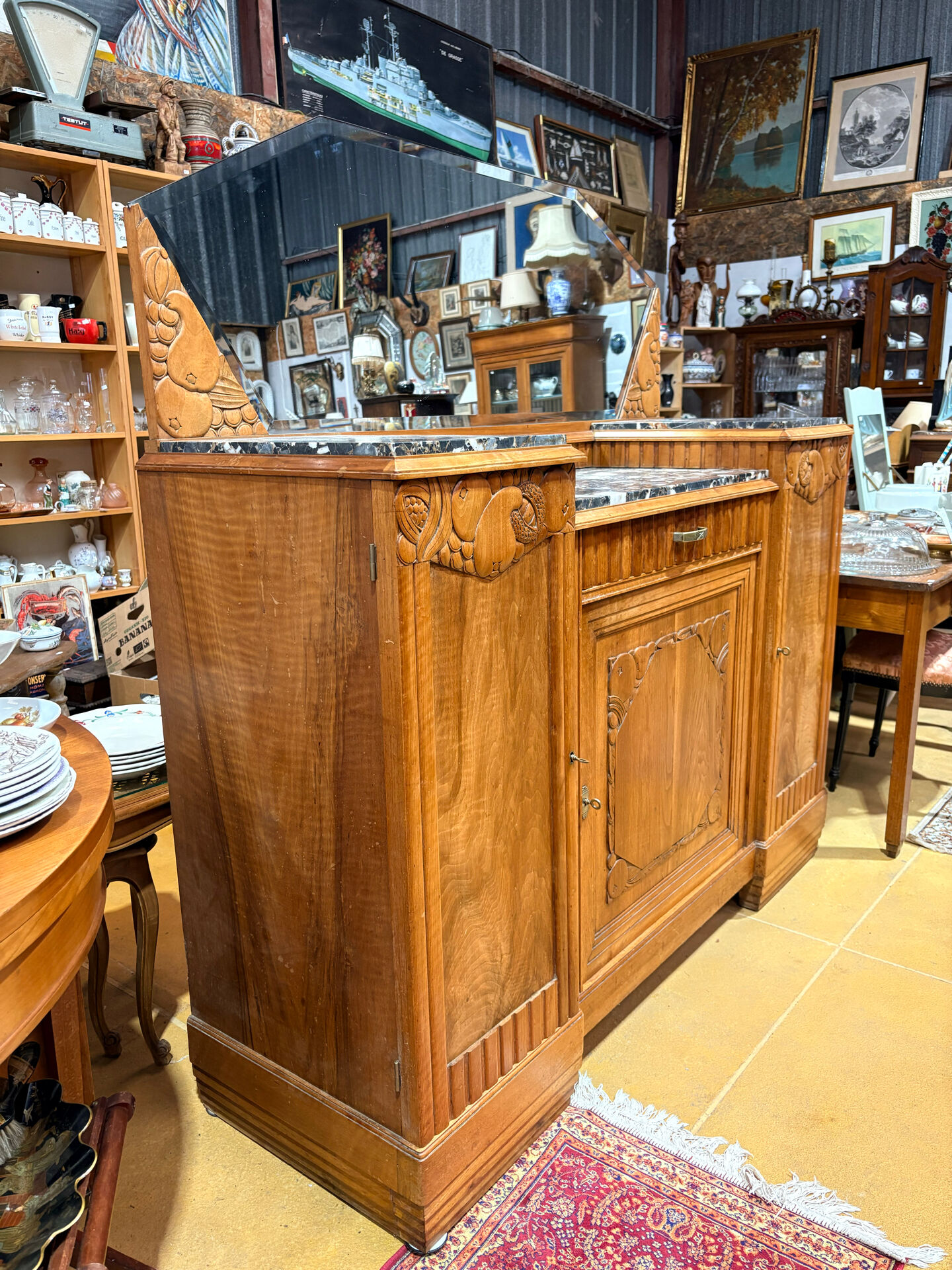 Art Deco buffet in carved walnut, marble and large mirror – 1930s