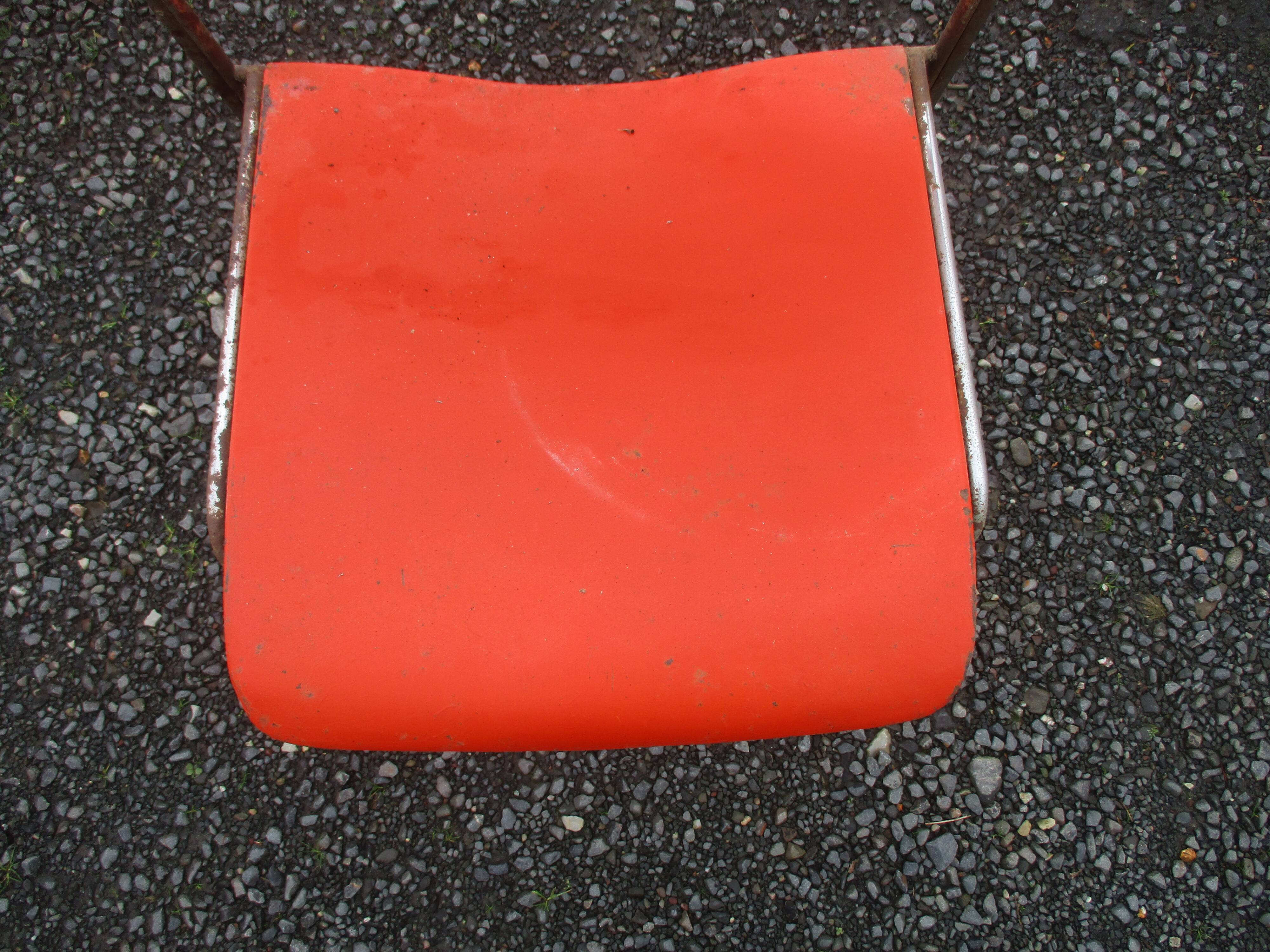 3 iron and plastic chairs
