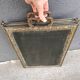 Antique fireplace screen in copper and brass from the 19th century.