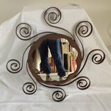 Pair of wrought iron sun mirrors