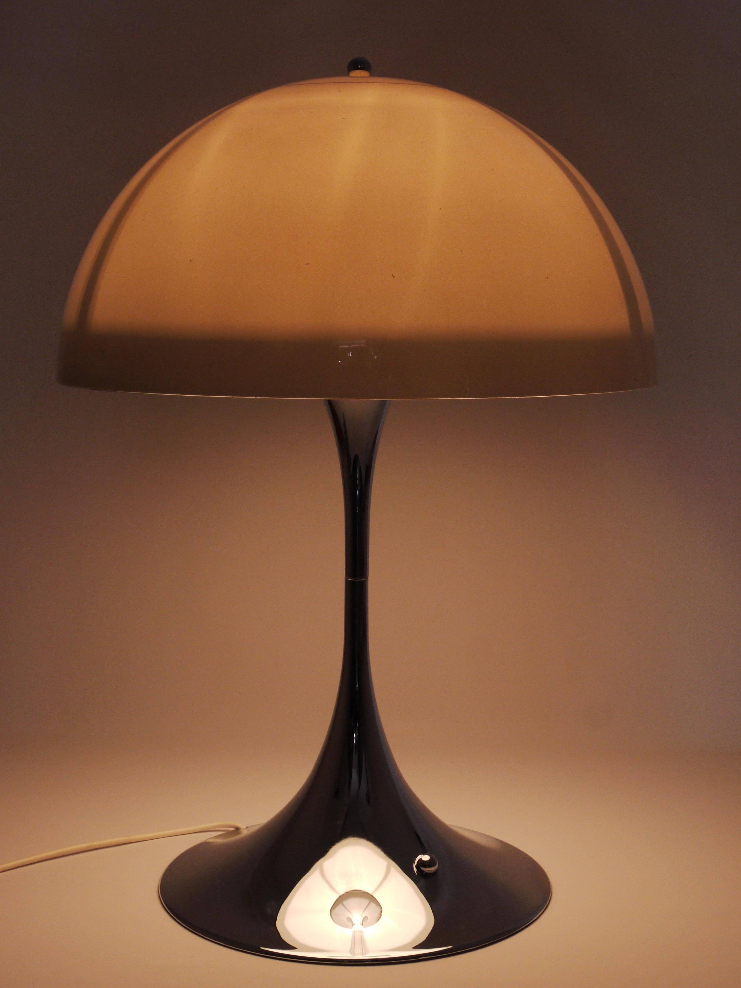 Rare Panthella table lamp by Verner Panton with a chrome base and grey shade.