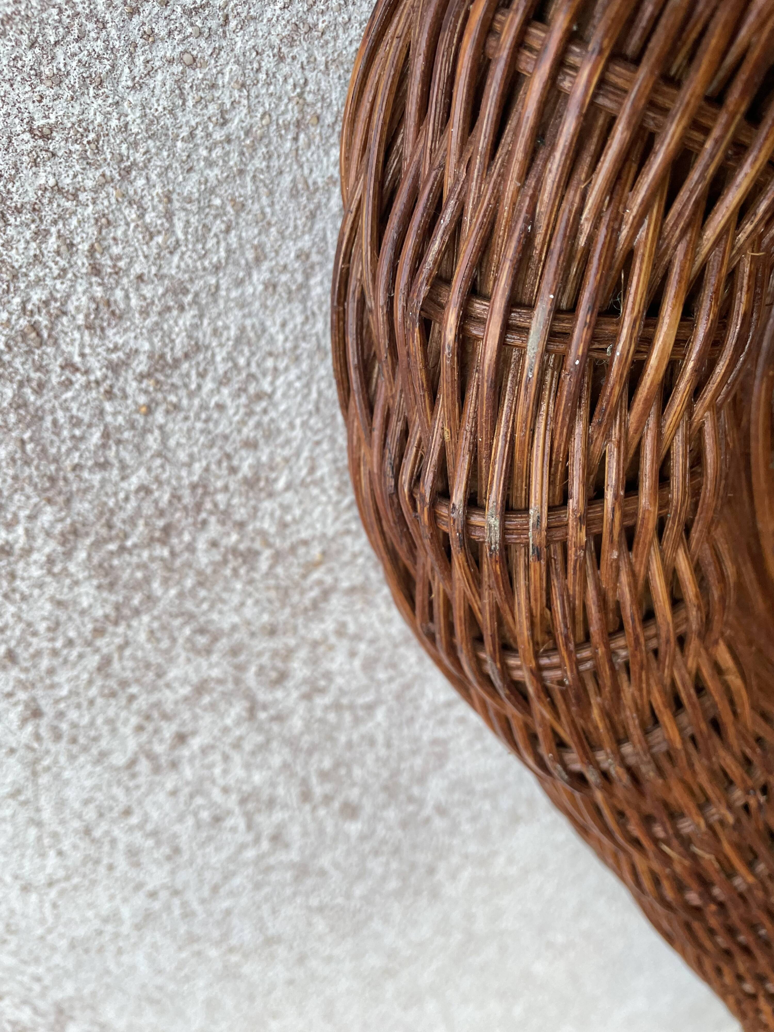 Curved rattan mirror 70s