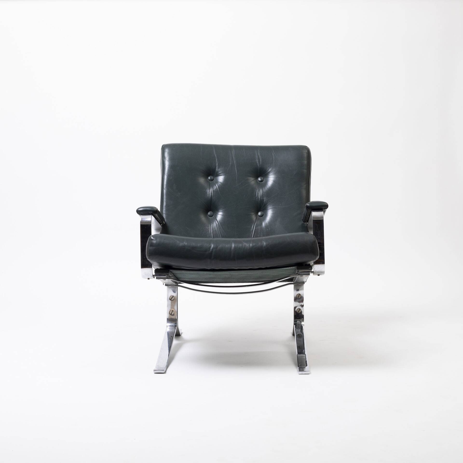 Green leather and chrome lounge chair, 1970s