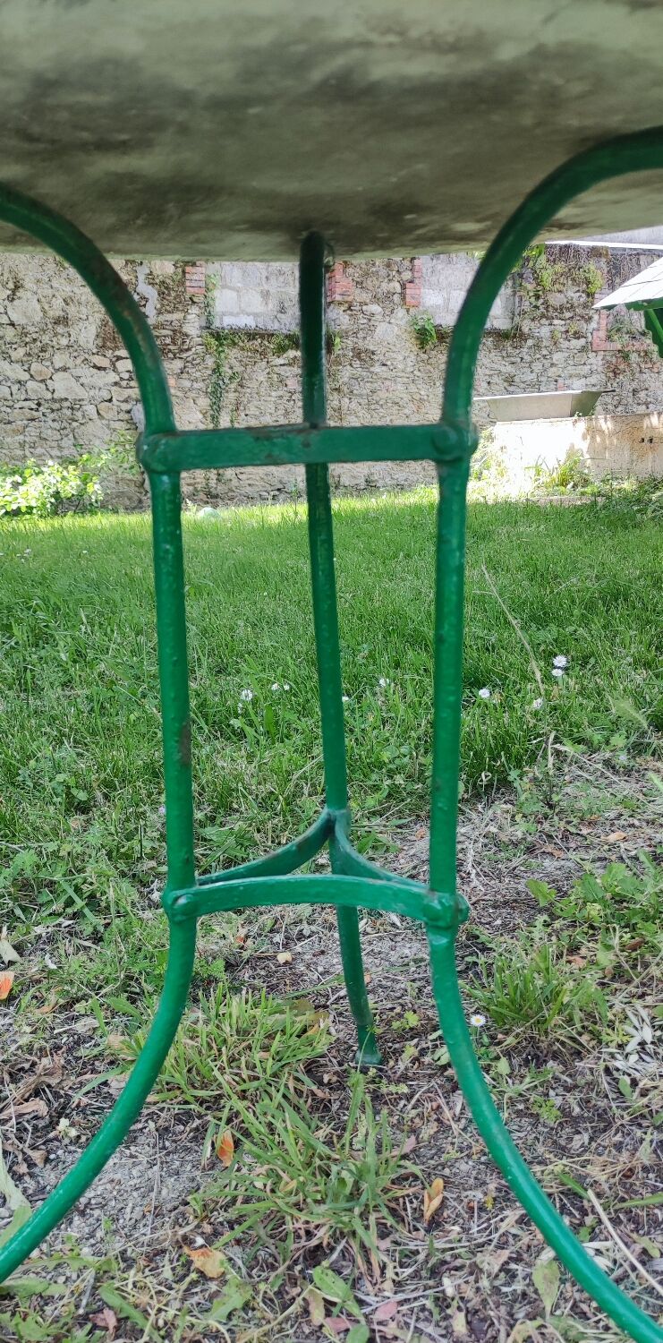 Old metal and wood pedestal table