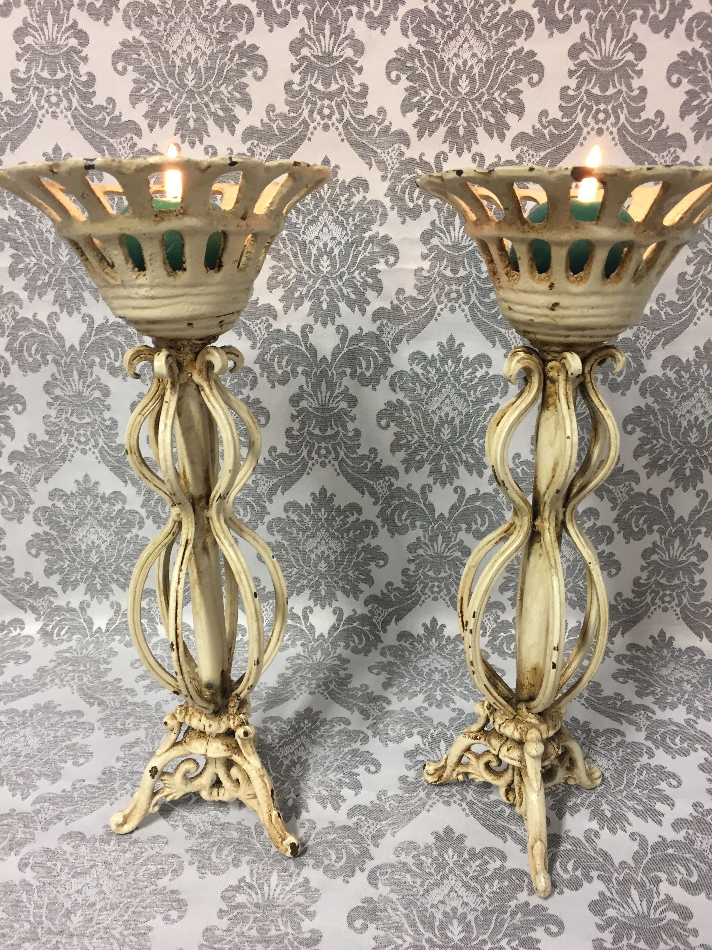 Pair of candlesticks patinated cast iron renaissance design