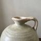 Wabi-sabi amphora vase in off-white and glazed, France circa 1970.