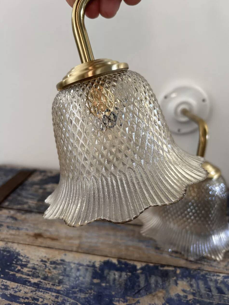 Pair of gold wall sconces