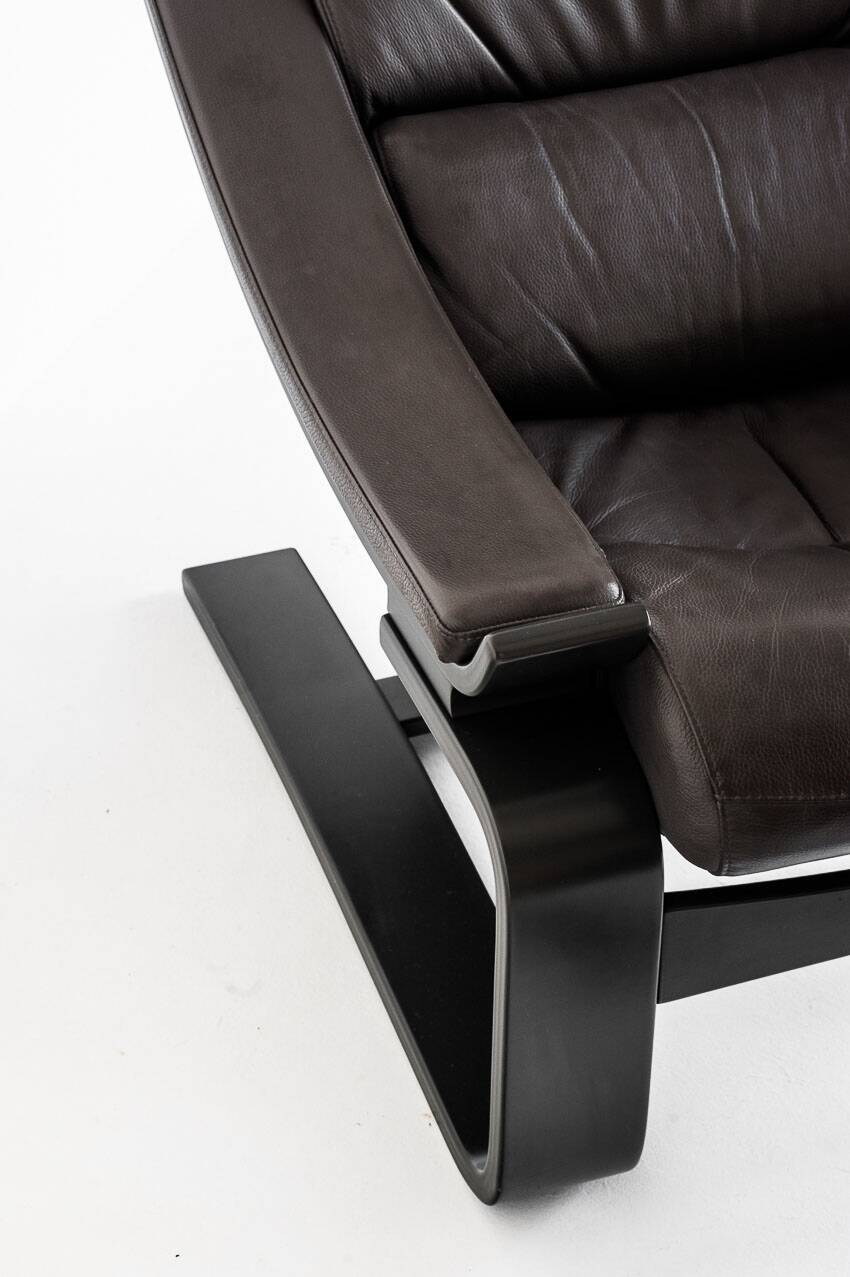 Kroken armchair + pouf designed by Ake Fribytter, published by Roche Bobois. France, 2000s.