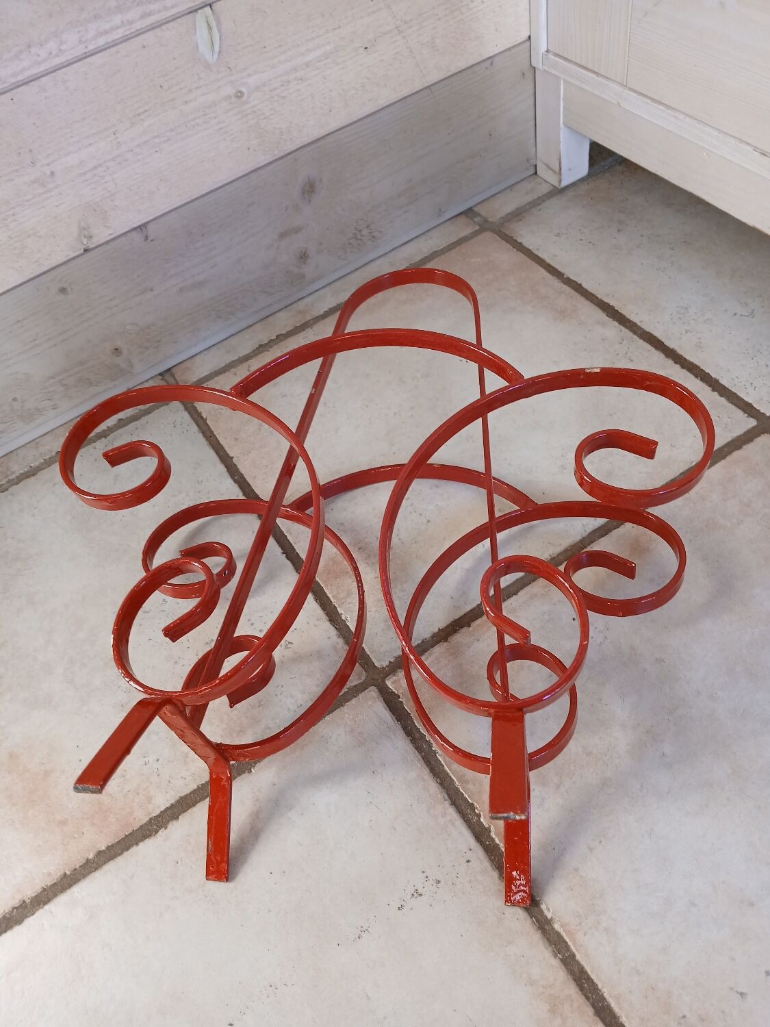 Vintage wrought iron magazine rack