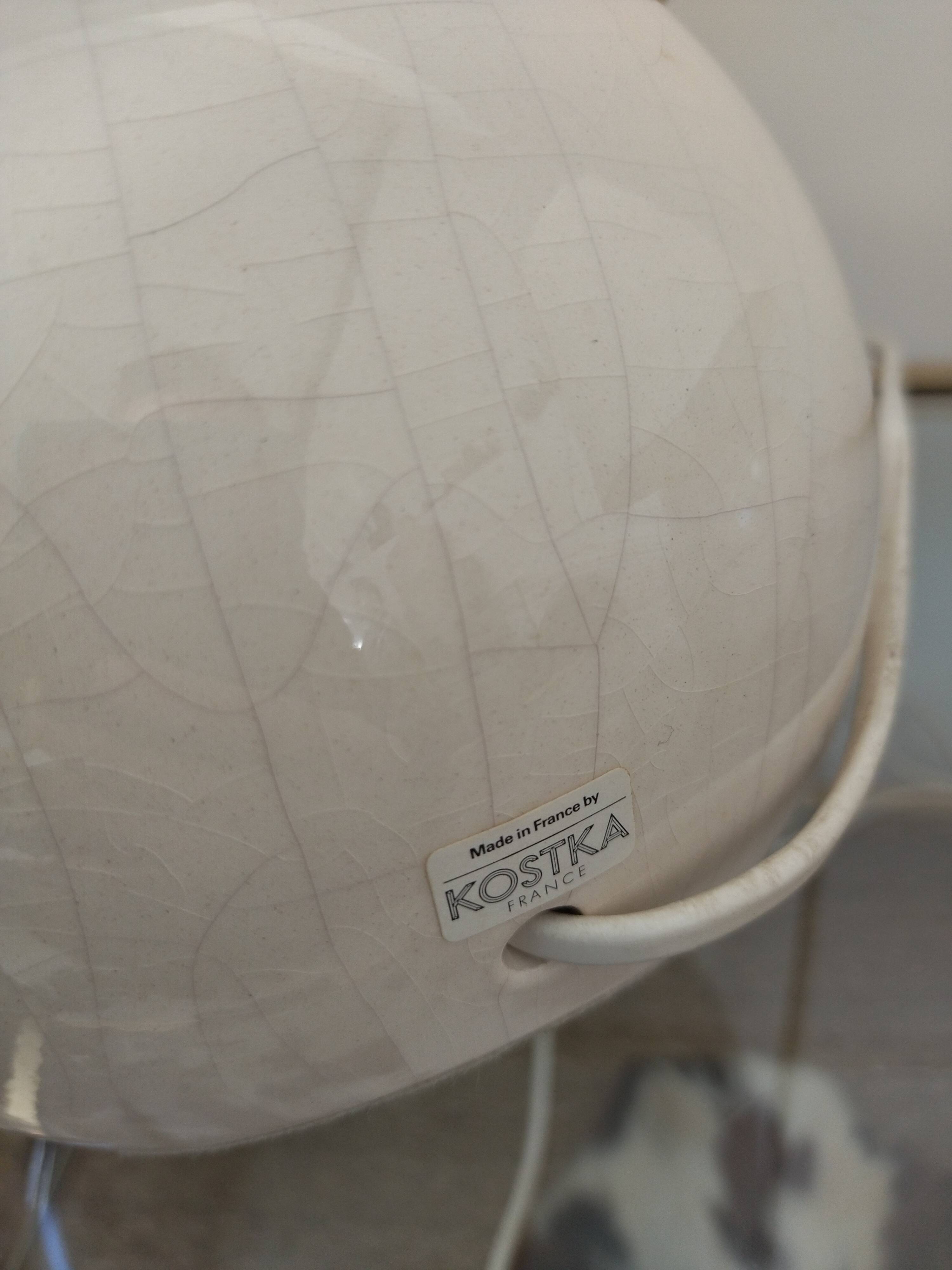 Pair of cracked white Kostka lamps
