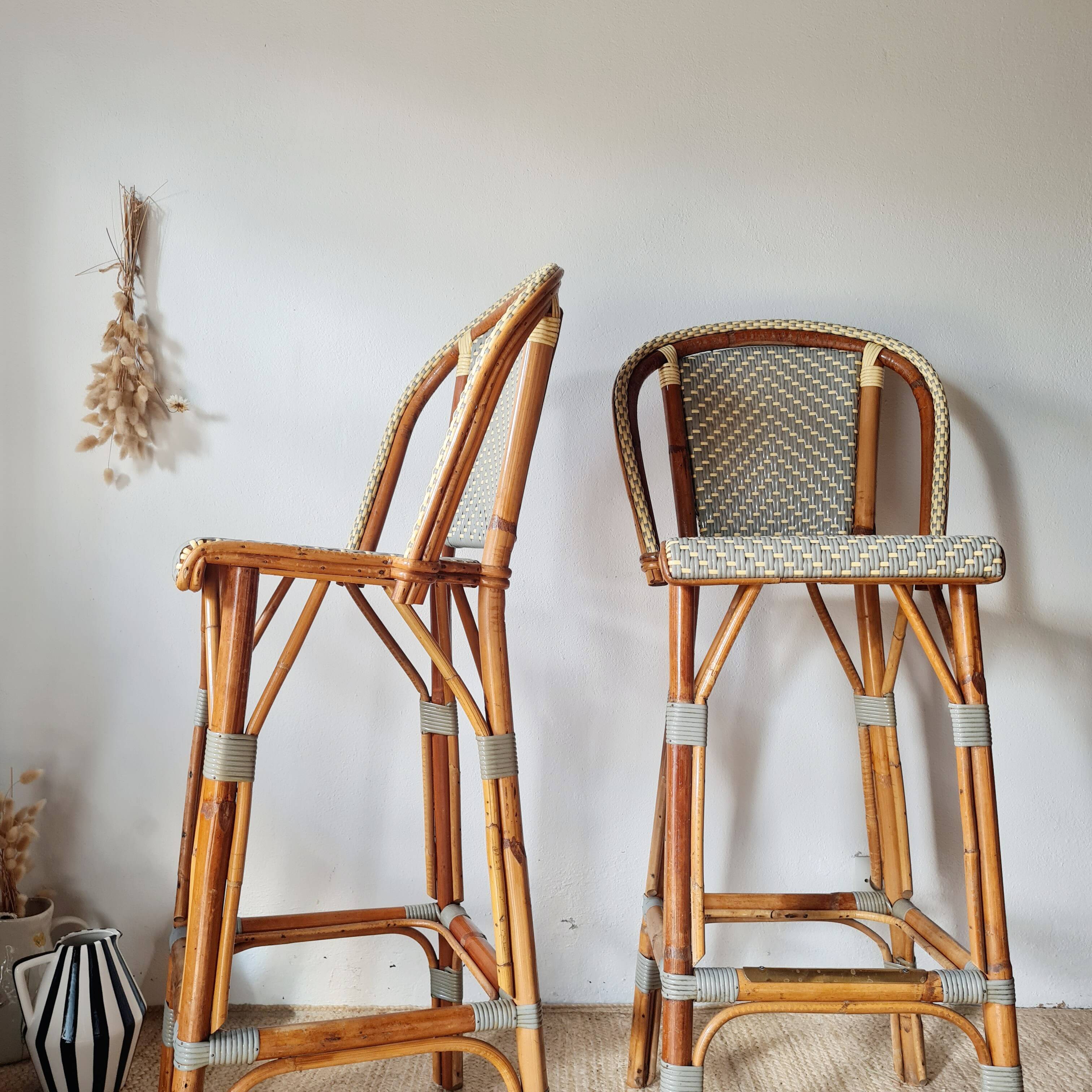 Pair of vintage Gatti bar stools in two-tone rattan and caning.