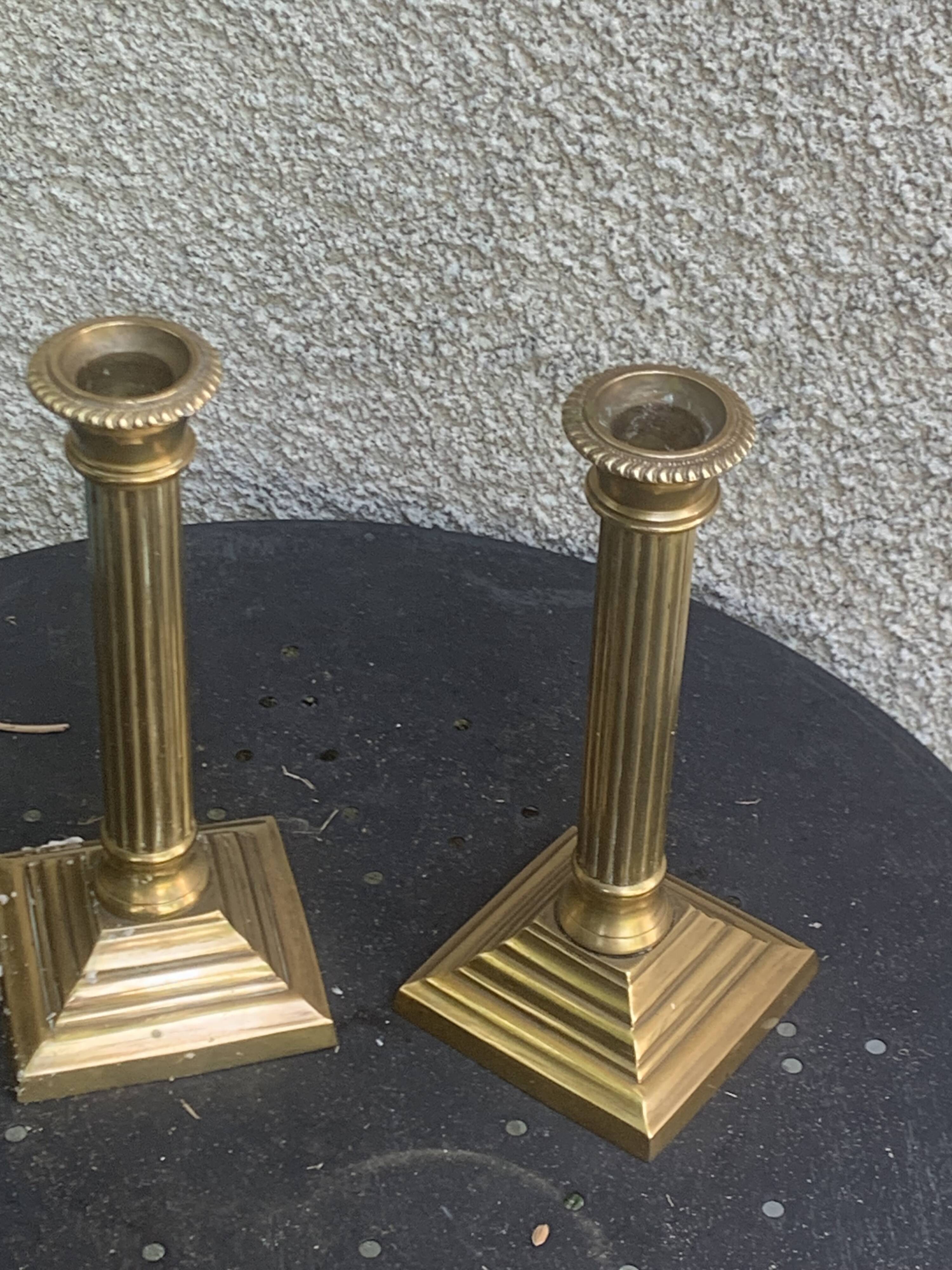 Pair of gilded brass candlesticks, vintage column shape