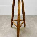 Brutalist bar stool in tripod elm