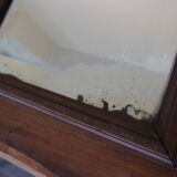 Old pediment mirror carved in wood