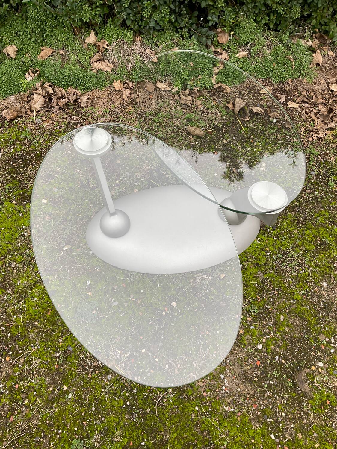 Naos designer coffee table in tempered glass and cast iron