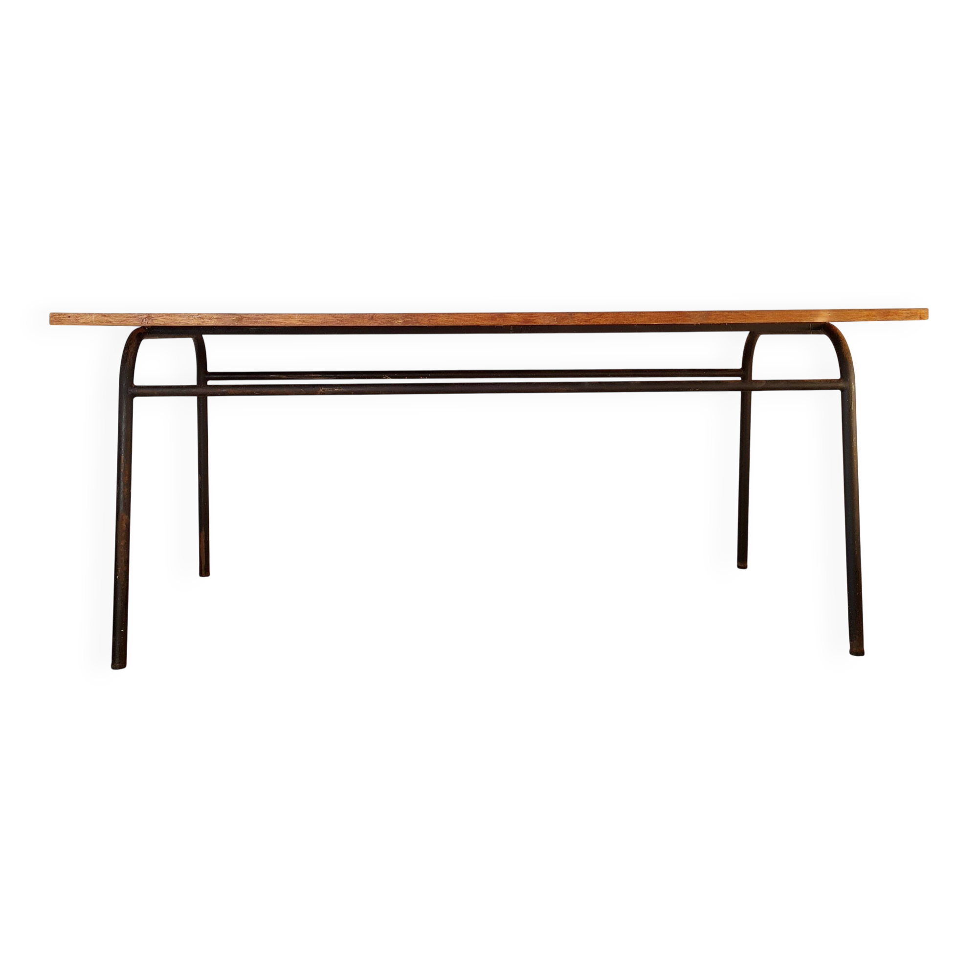 Table with tubular metal legs and wooden top.