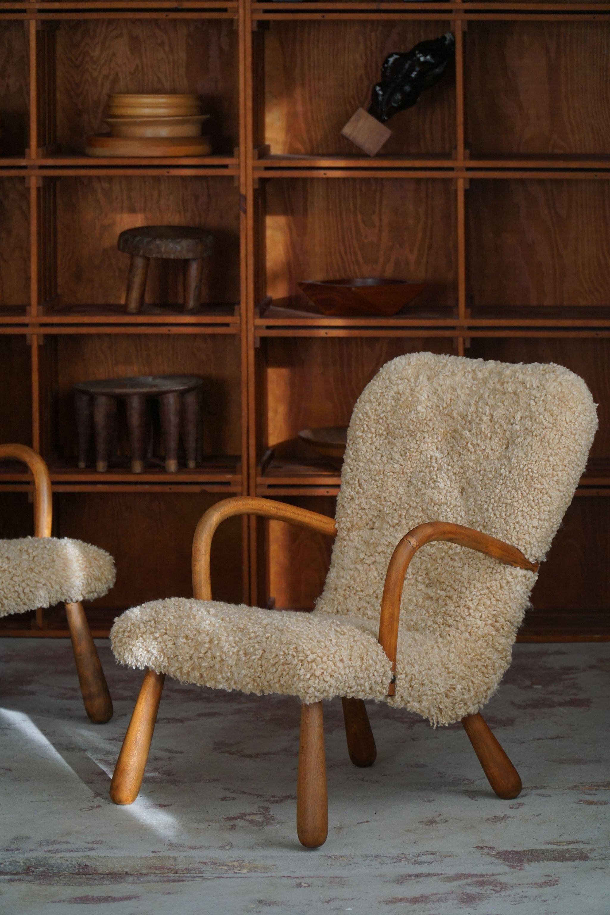 Pair of clam chairs in lambswool, Skive Møbelfabrik, Denmark, 1950s
