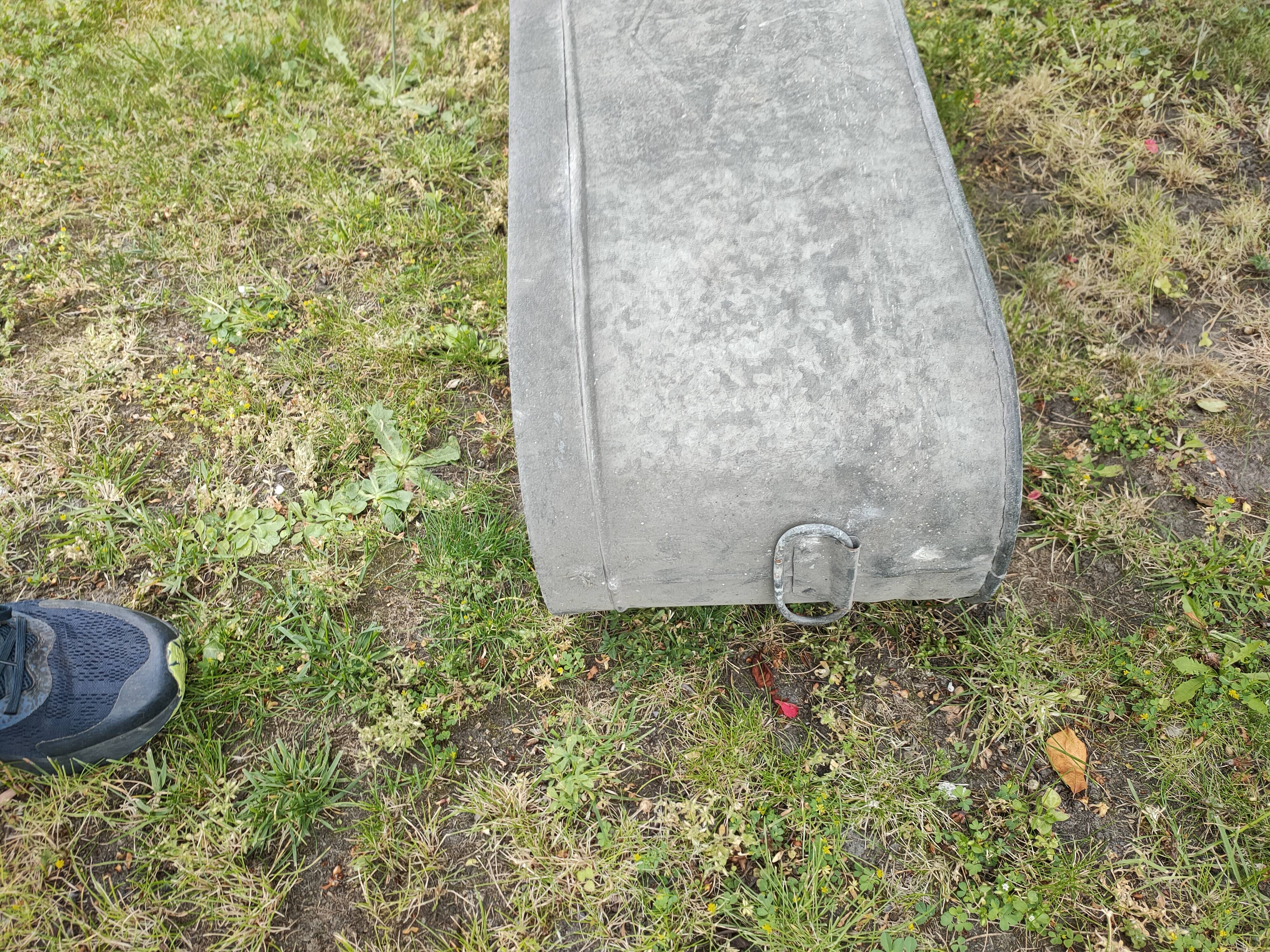 Antique children's bathtub in zinc