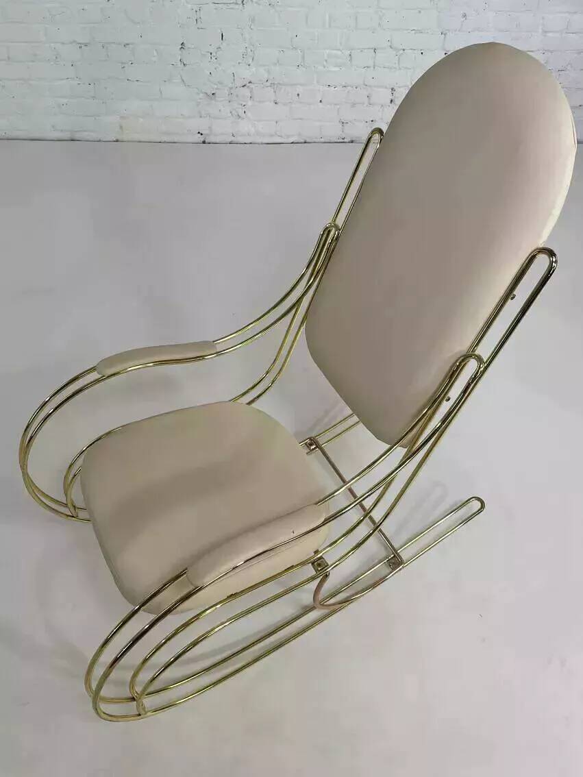 1960s rocking chair in brass and ecru imitation leather