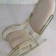 1960s rocking chair in brass and ecru imitation leather