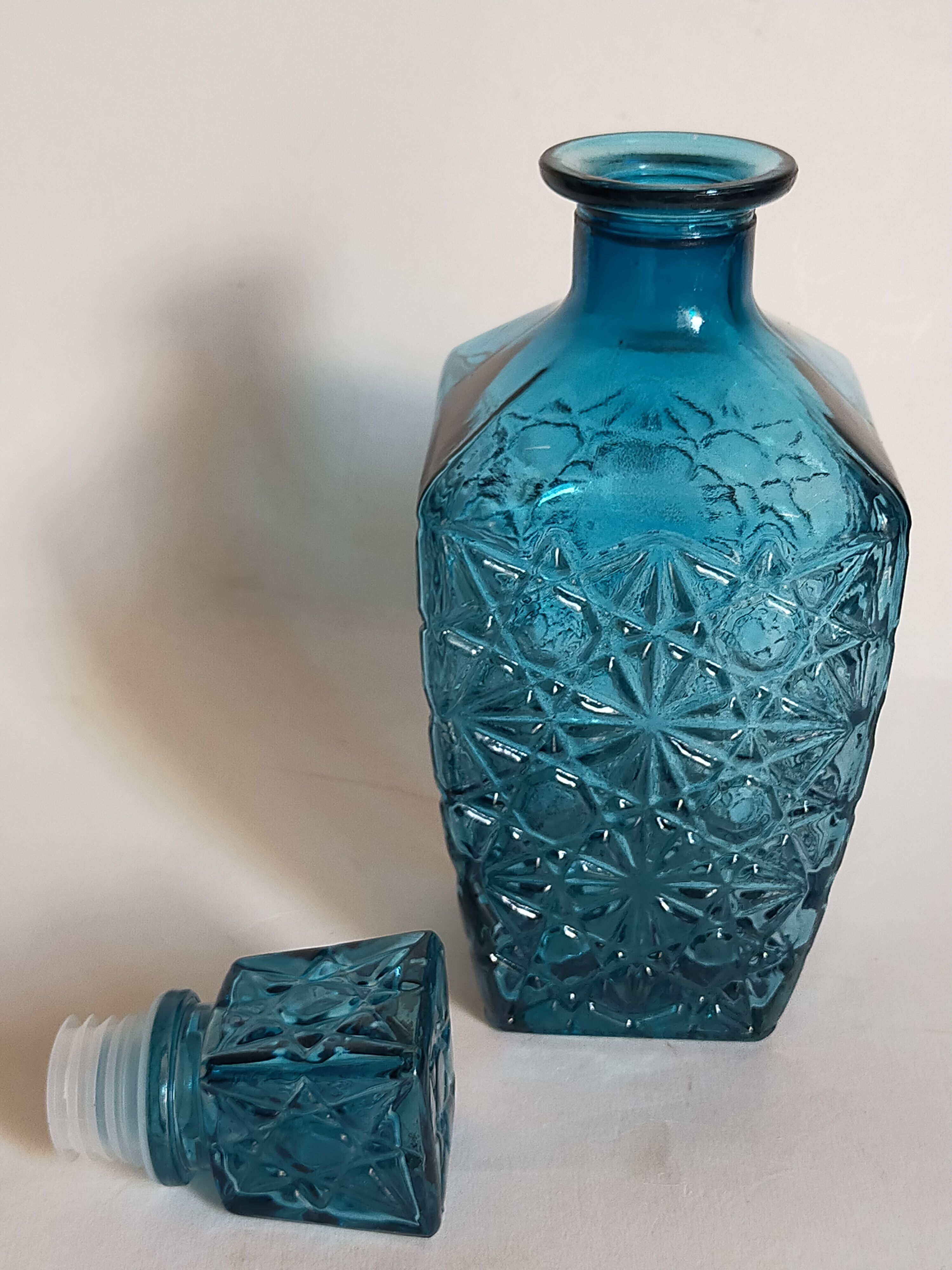 Vintage blue glass whiskey decanter