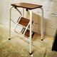 Retractable foot step ladder