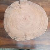 Brutalist tripod coffee table in solid wood.