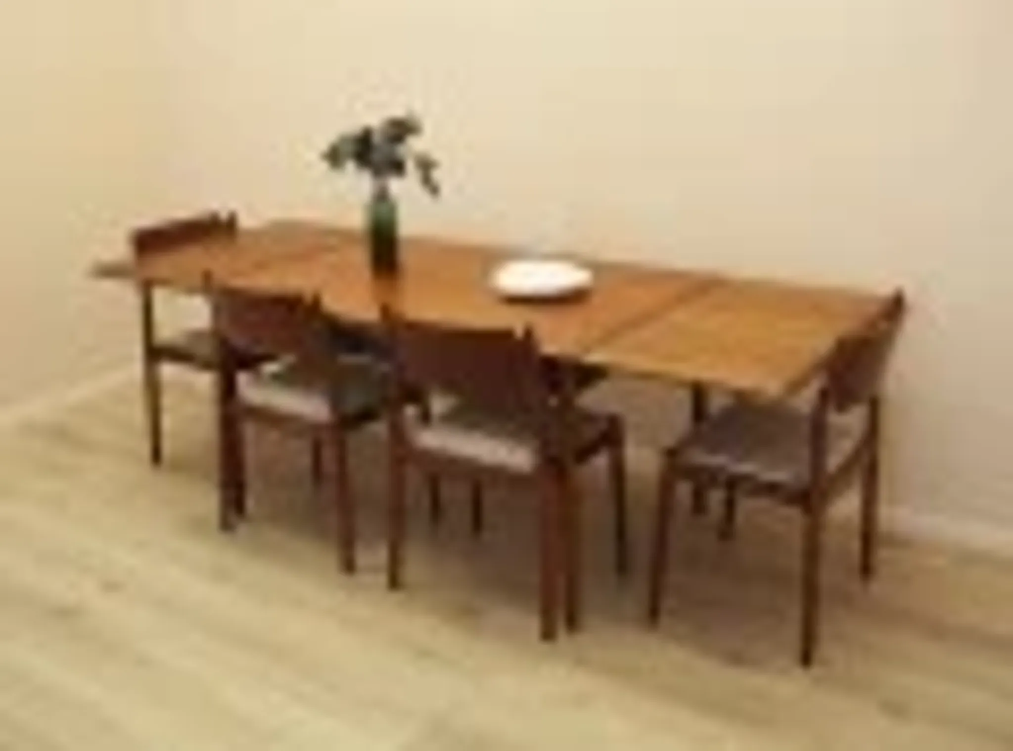 Danish extendable dining table, teak veneer, solid wood legs, leaf storage, 1970s