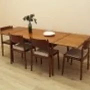 Danish extendable dining table, teak veneer, solid wood legs, leaf storage, 1970s
