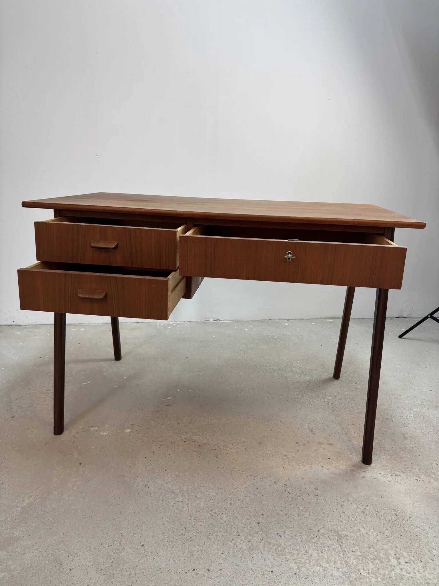 Flat desk in teak with three drawers, Scandinavian work from the 1950s-70s.