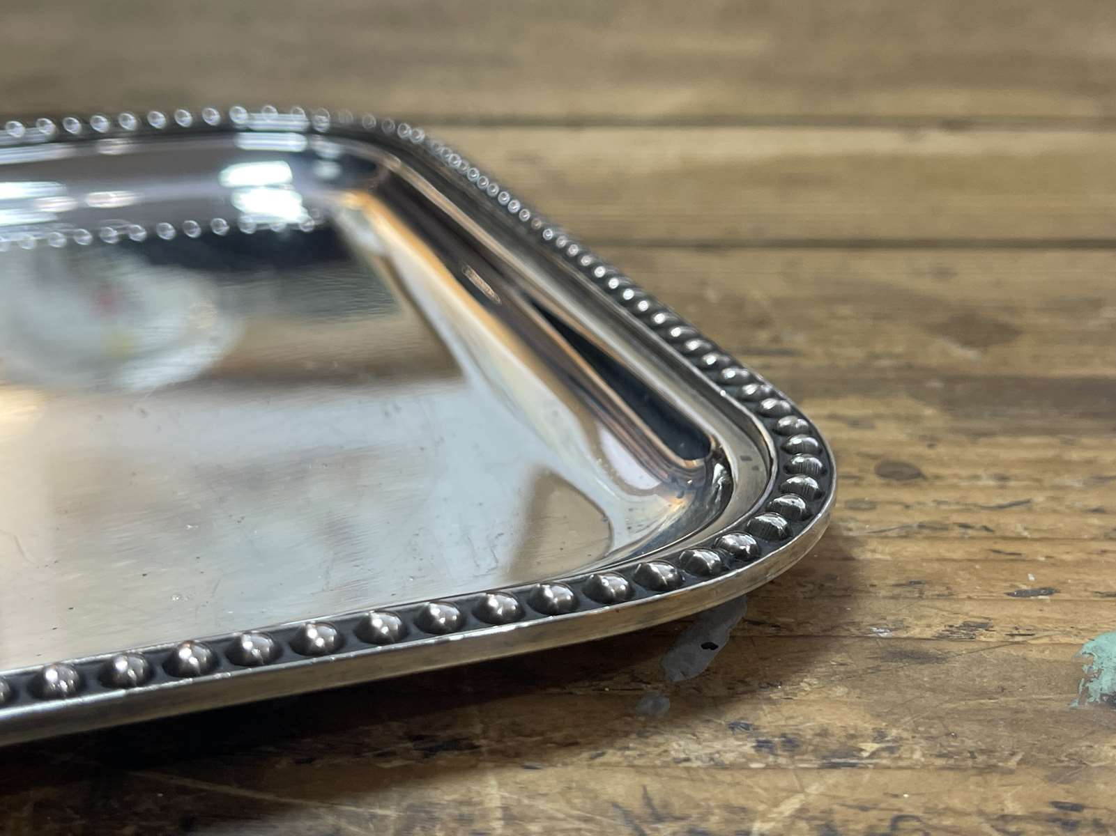 Small rectangular and beaded silver metal top