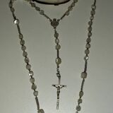 Old mother-of-pearl rosary in its egg box