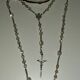 Old mother-of-pearl rosary in its egg box
