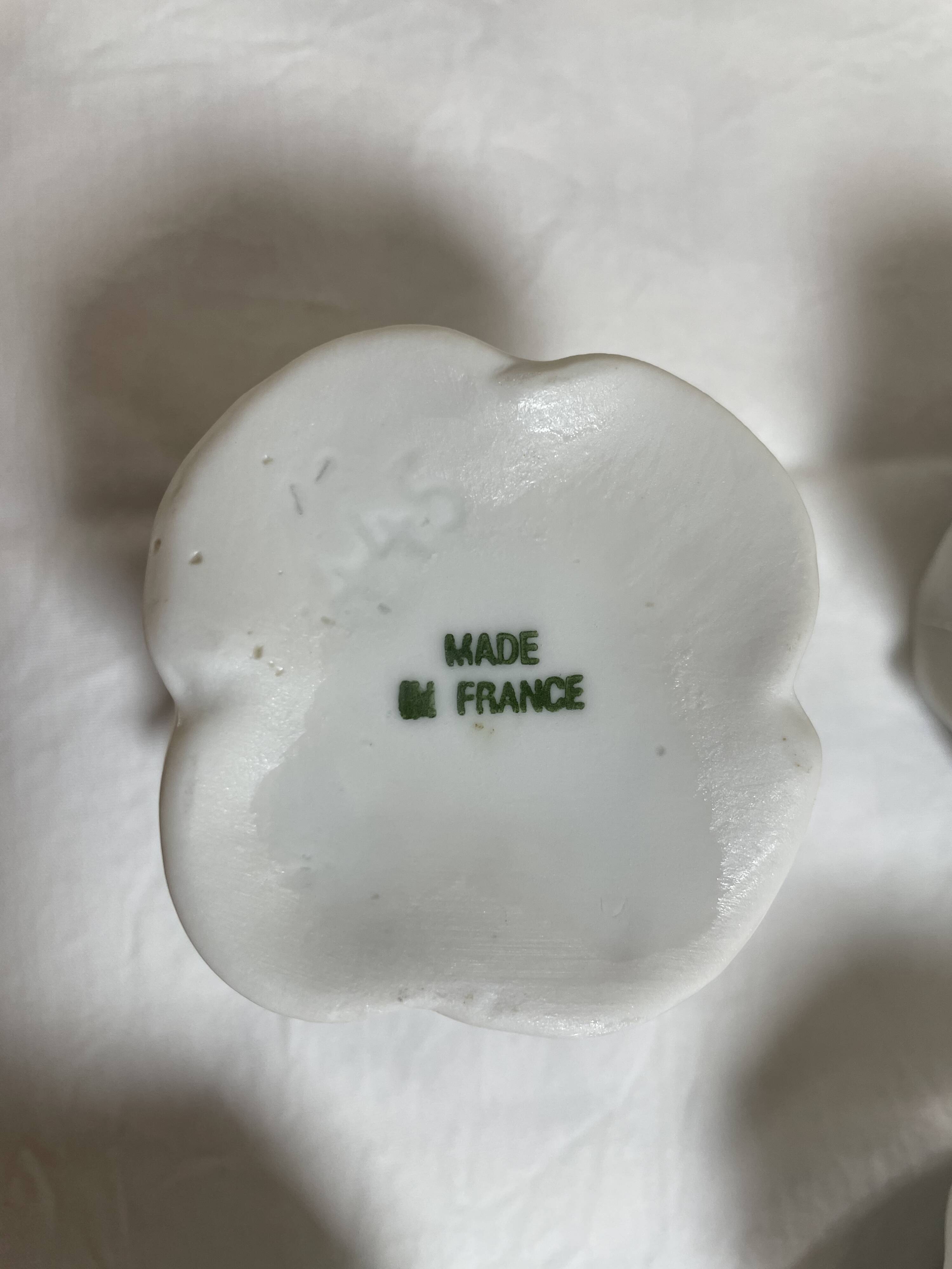 White porcelain rose shaped candle holders