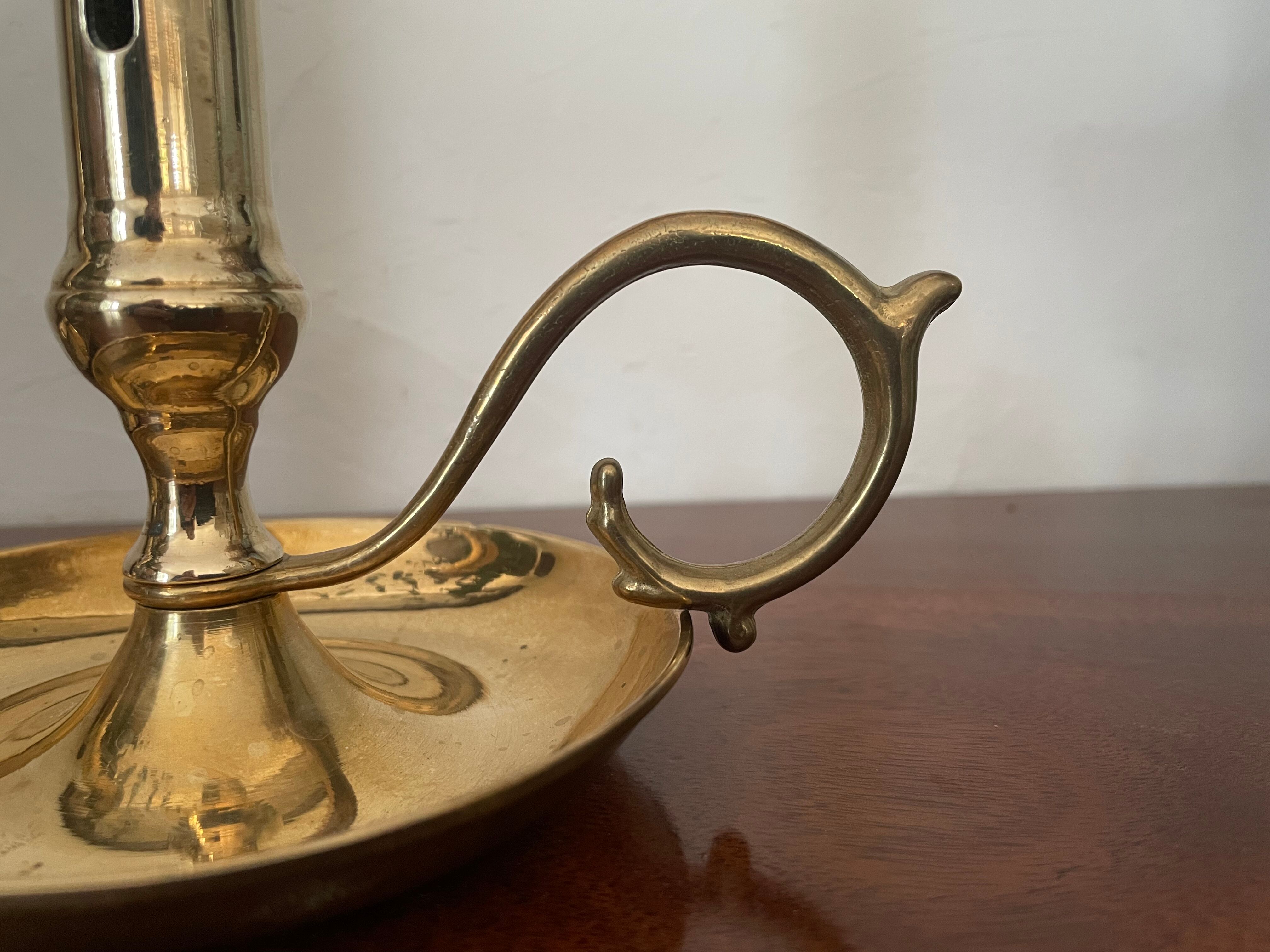 Pair of brass candle holders