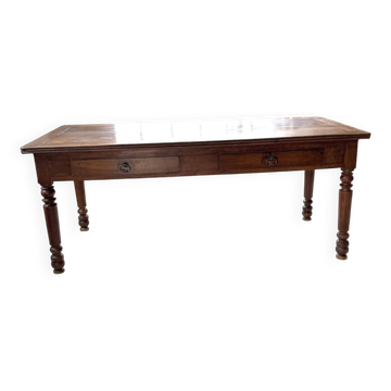 Farm table or solid walnut draper's table from 1900