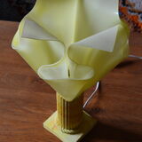 Lamp draped on column