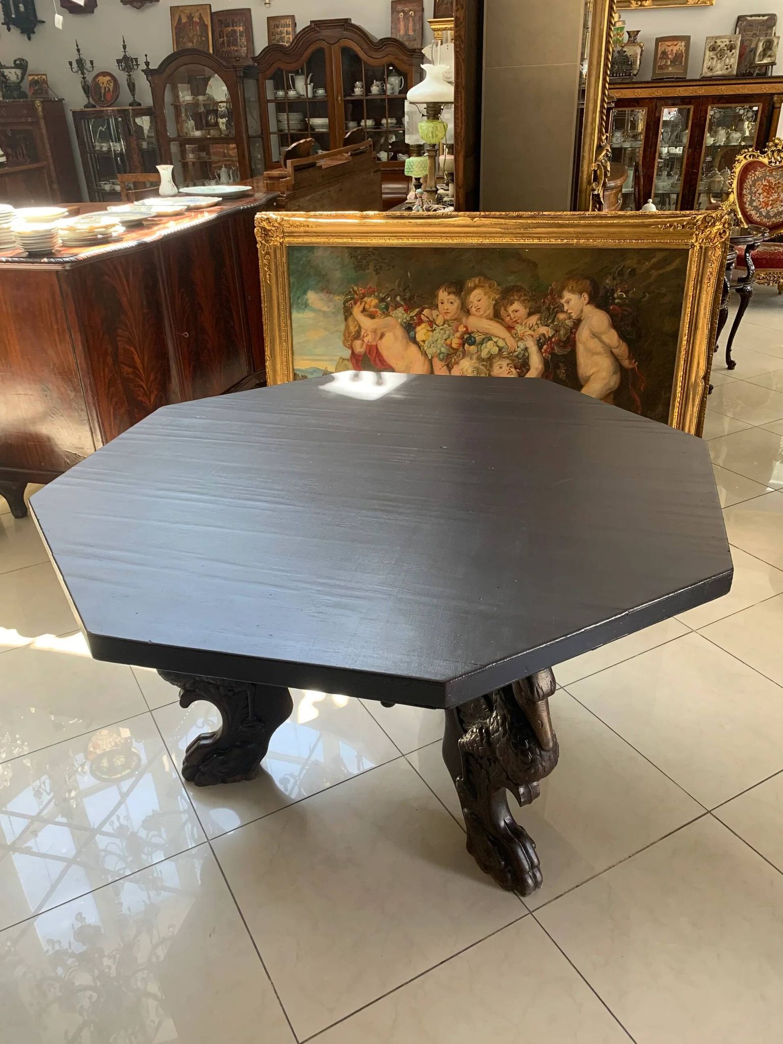 Octagonal oak table, 19th century, griffins