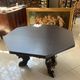 Octagonal oak table, 19th century, with griffins.
