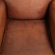 Sturdy vintage sheepskin armchair with a beautiful cognac colour