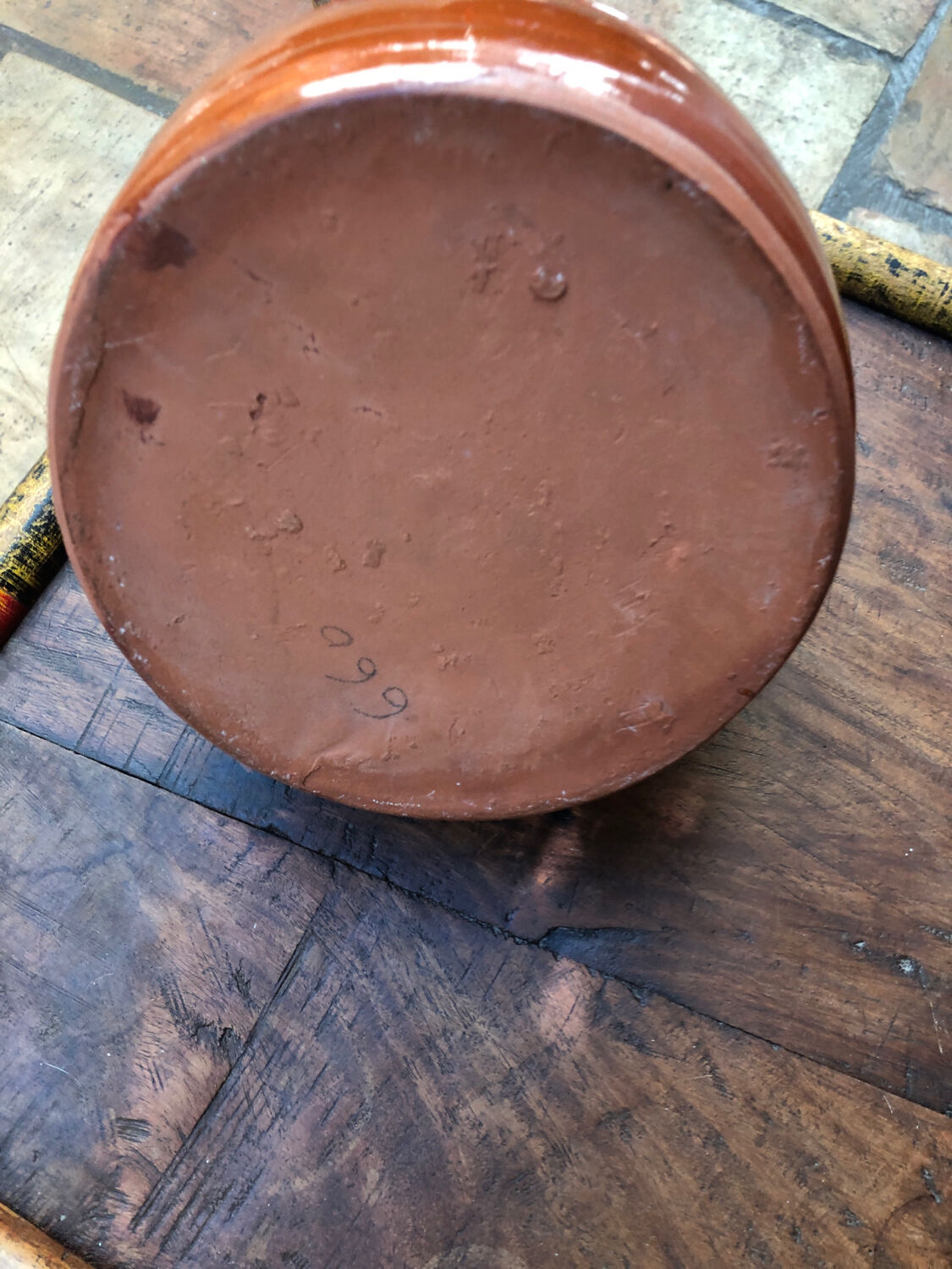 Orange glazed terracotta gargoulette