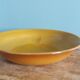 Arcopal Volcan salad bowl in caramel orange glass from the 1970s.