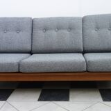 Three seater sofa in fabric and wood