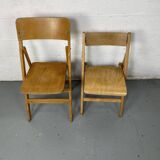 Pair of mismatched wooden folding chairs