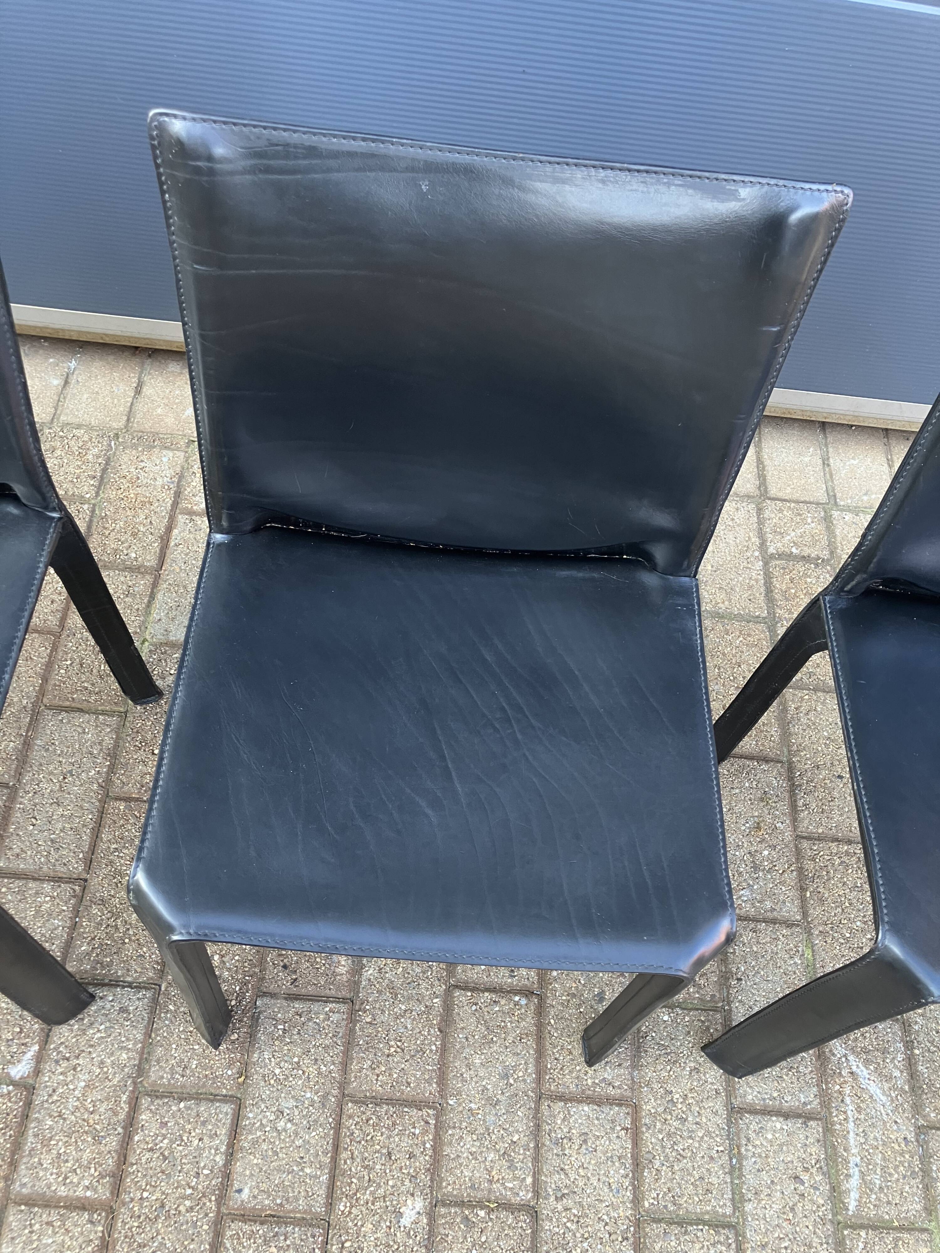 4 black Cassina Cab chairs by Mario Bellini