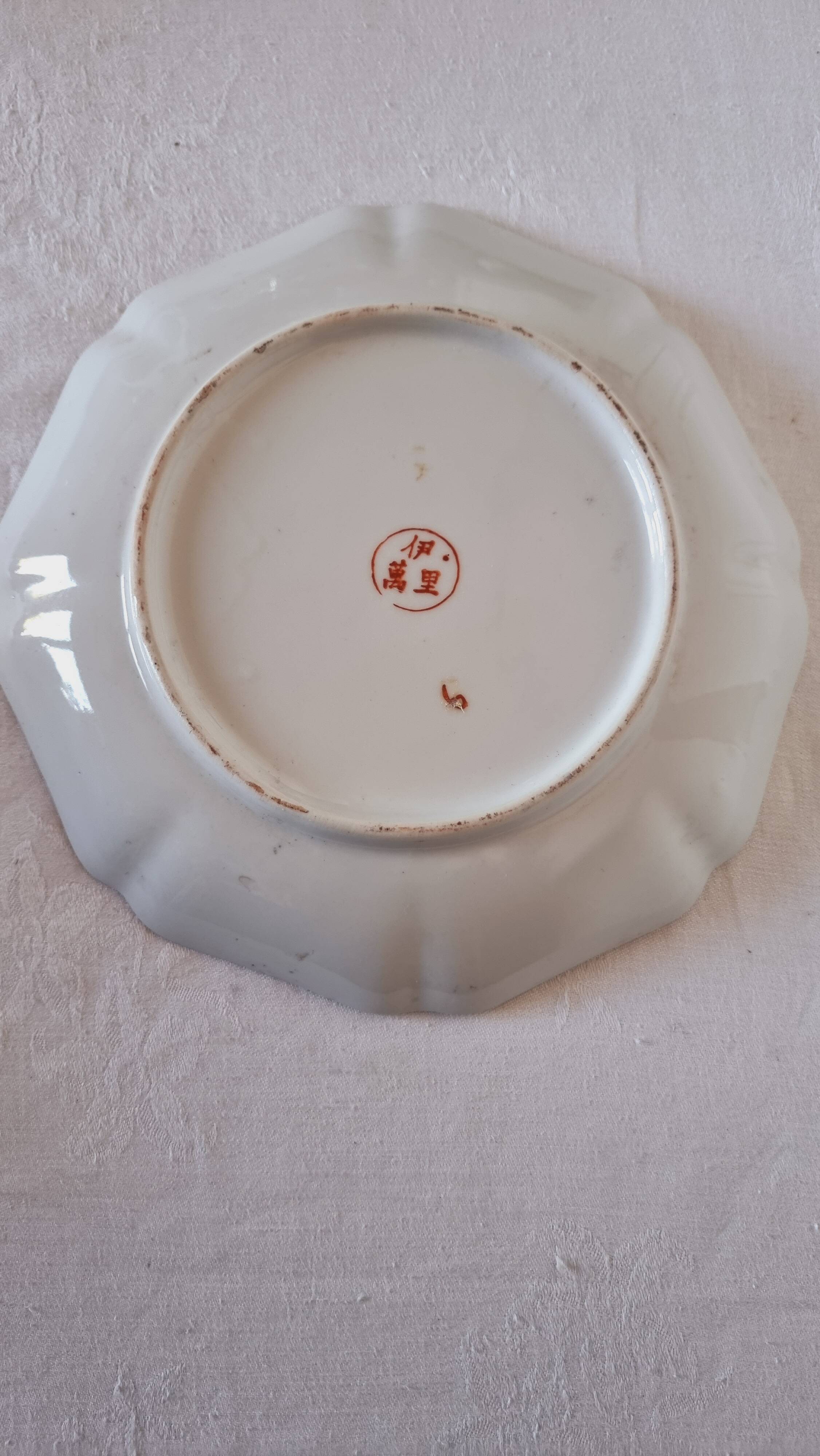 Imari-style porcelain plate, hand-painted, Japan, mid-20th century.