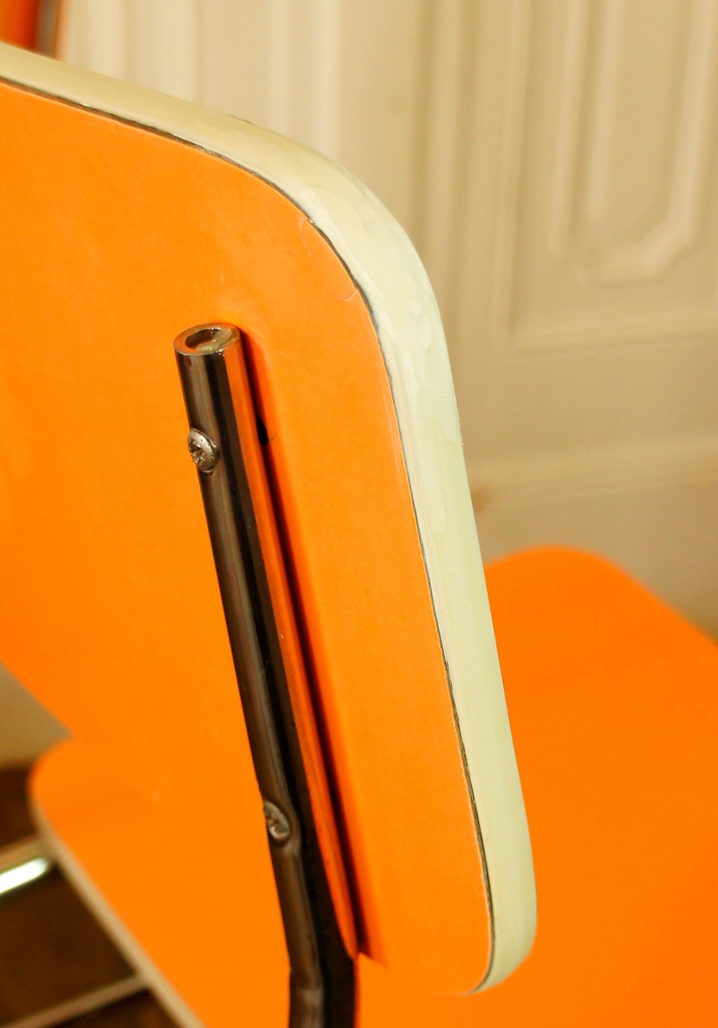Pair of orange Formica "Tublac" chairs