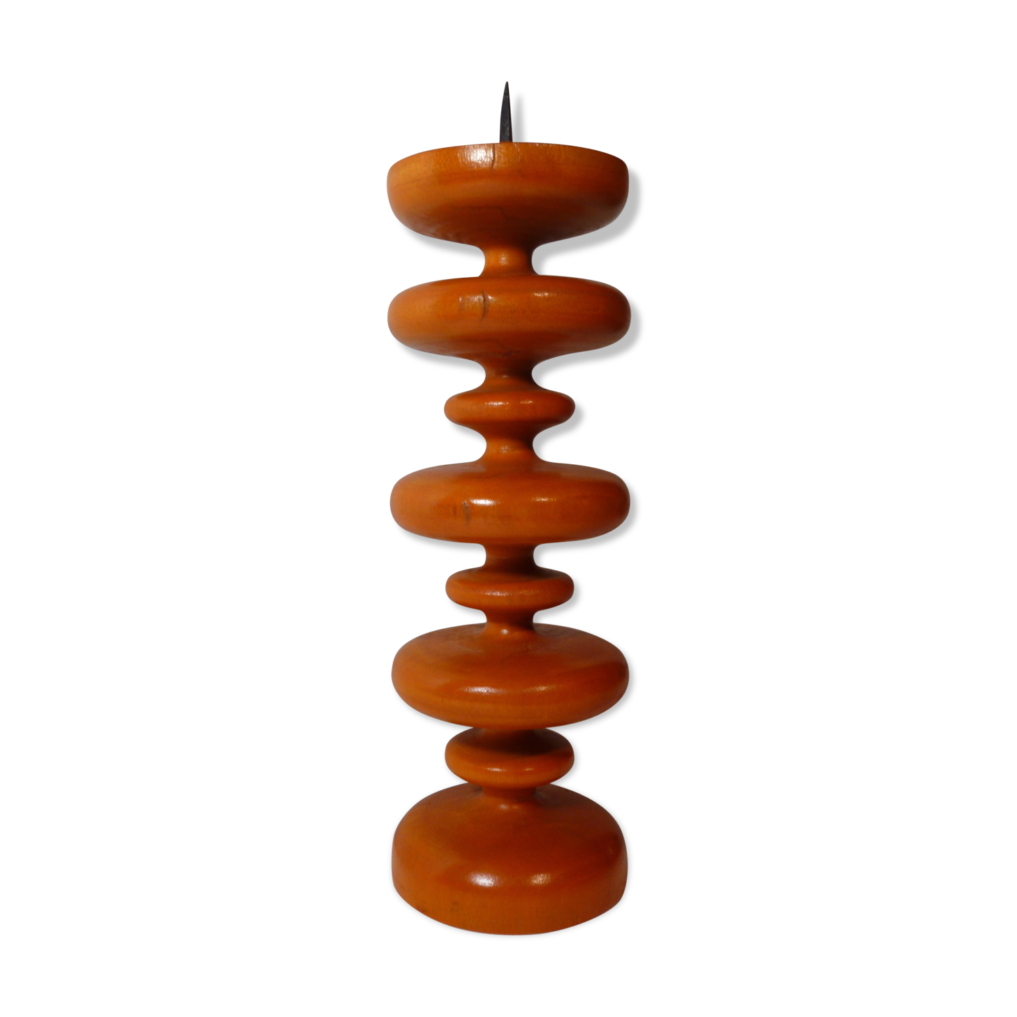 Vintage wooden candlestick turned orange