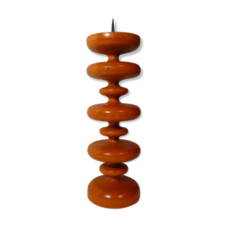 Vintage wooden candlestick turned orange