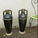 Ceramic vases with art nouveau brass frame.